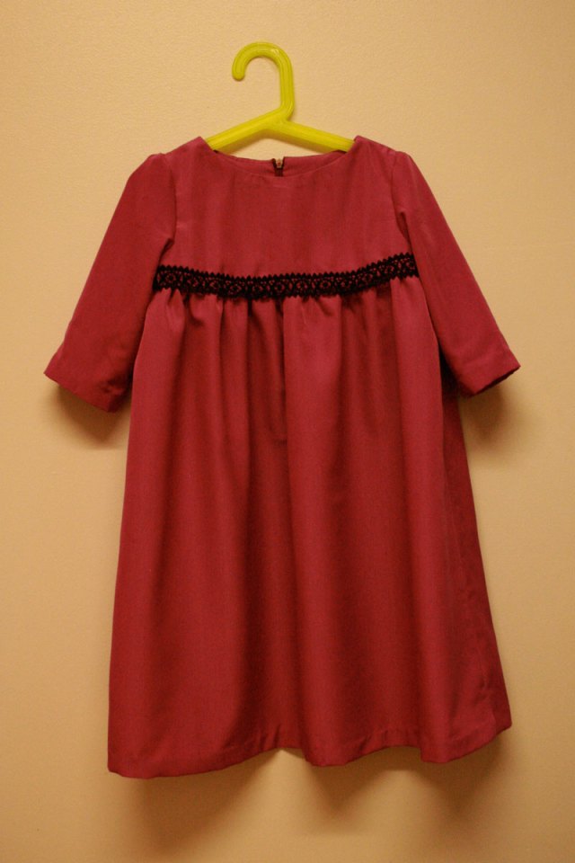 Samaria pinky-purple dress hanging up