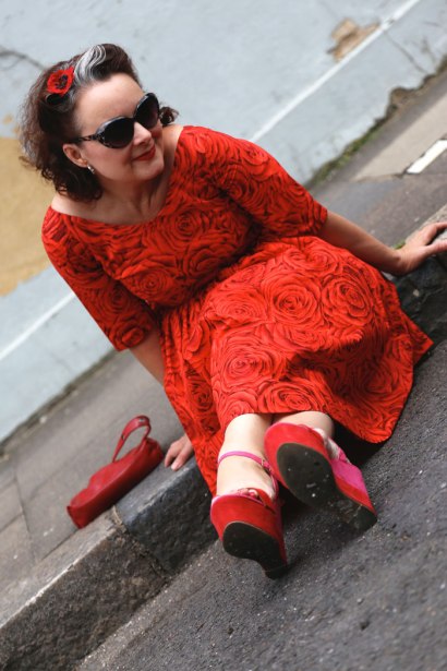 red rose lawn dress on the kerb